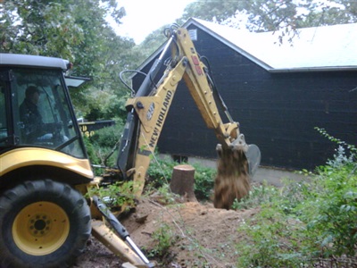 Tractor helping with construction project